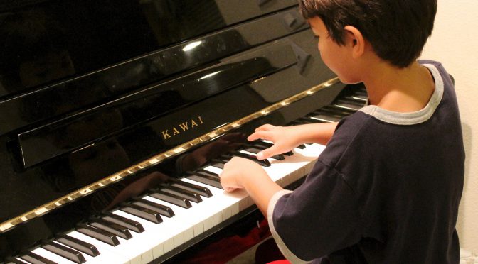 pianoles met leerling